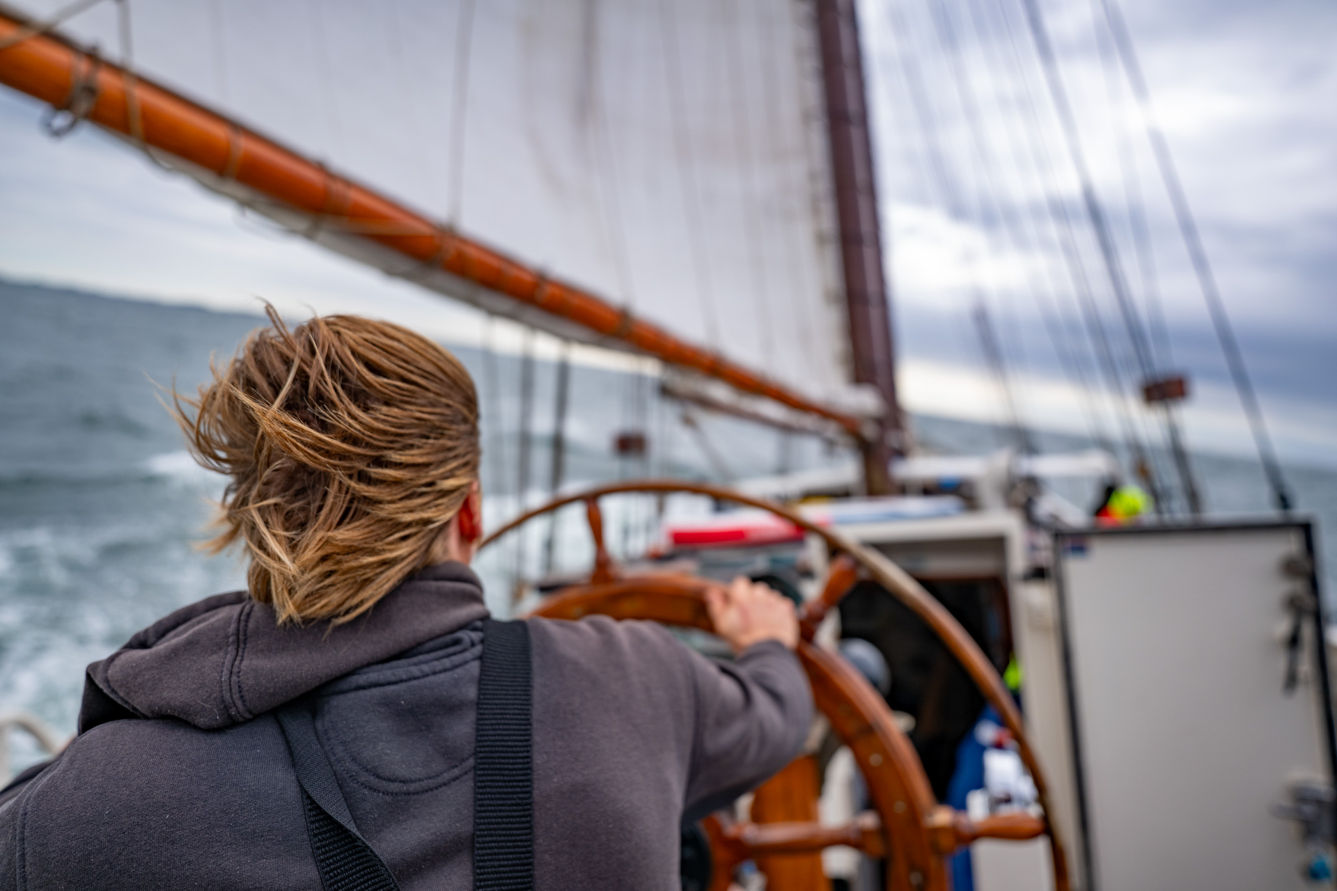Sailor on a a sailboat