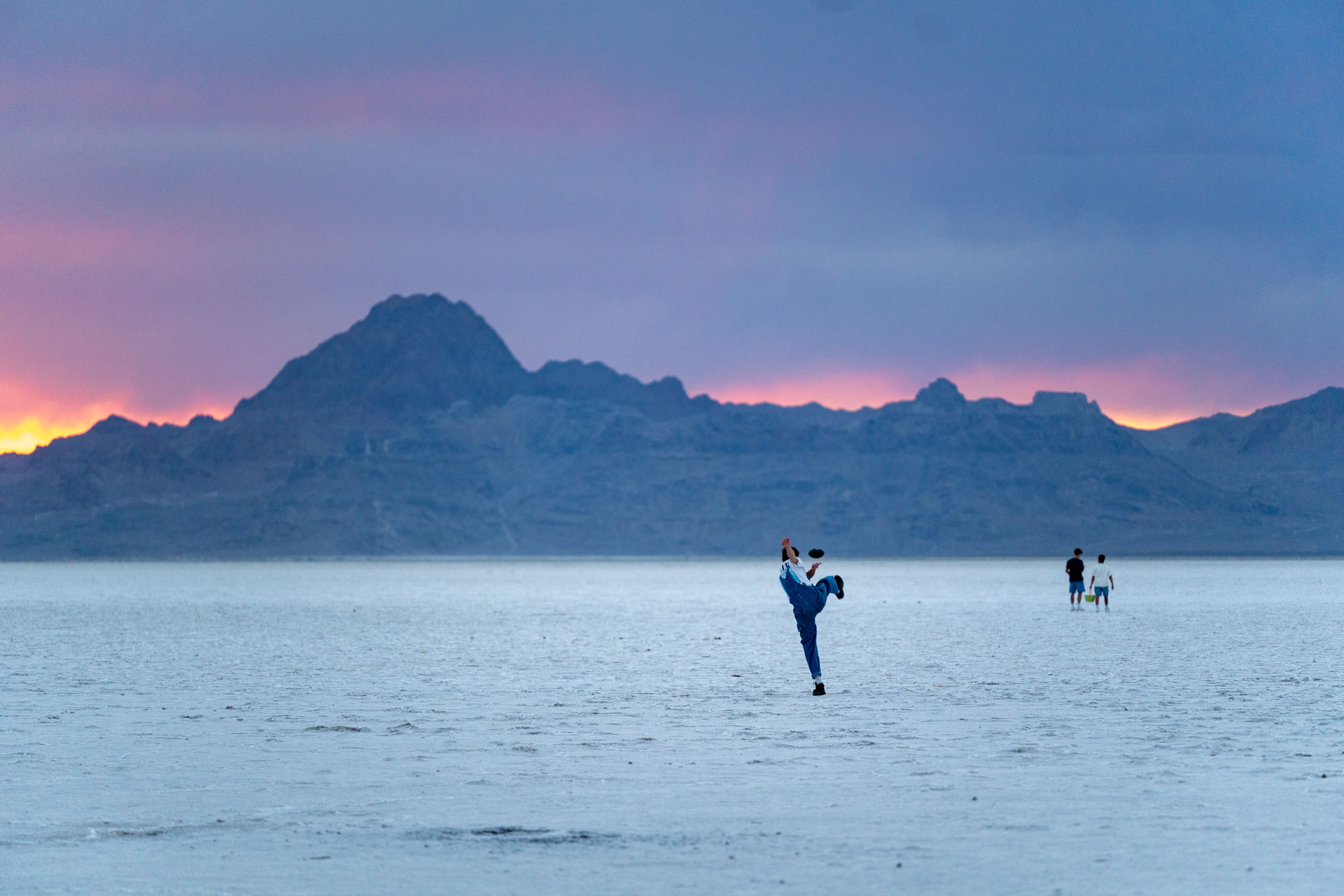 Saltflat with a person kicking a football